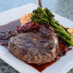 close-up photo of cooked food on square white plate